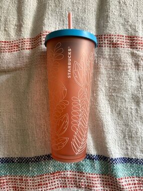 Starbucks Orange Tumbler with Blue Lid and Pink Straw